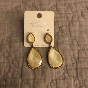 Beautiful cream colored teardrop shaped earring